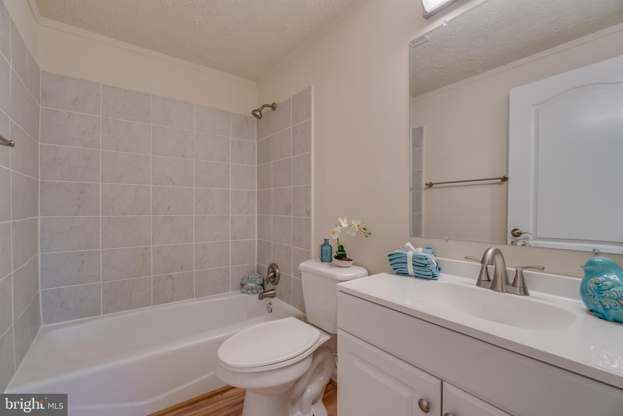 14562 Ridge Road King George, VA 22485 - Photo 11 of 16 Full bathroom all new tile, sinks, fixtures!