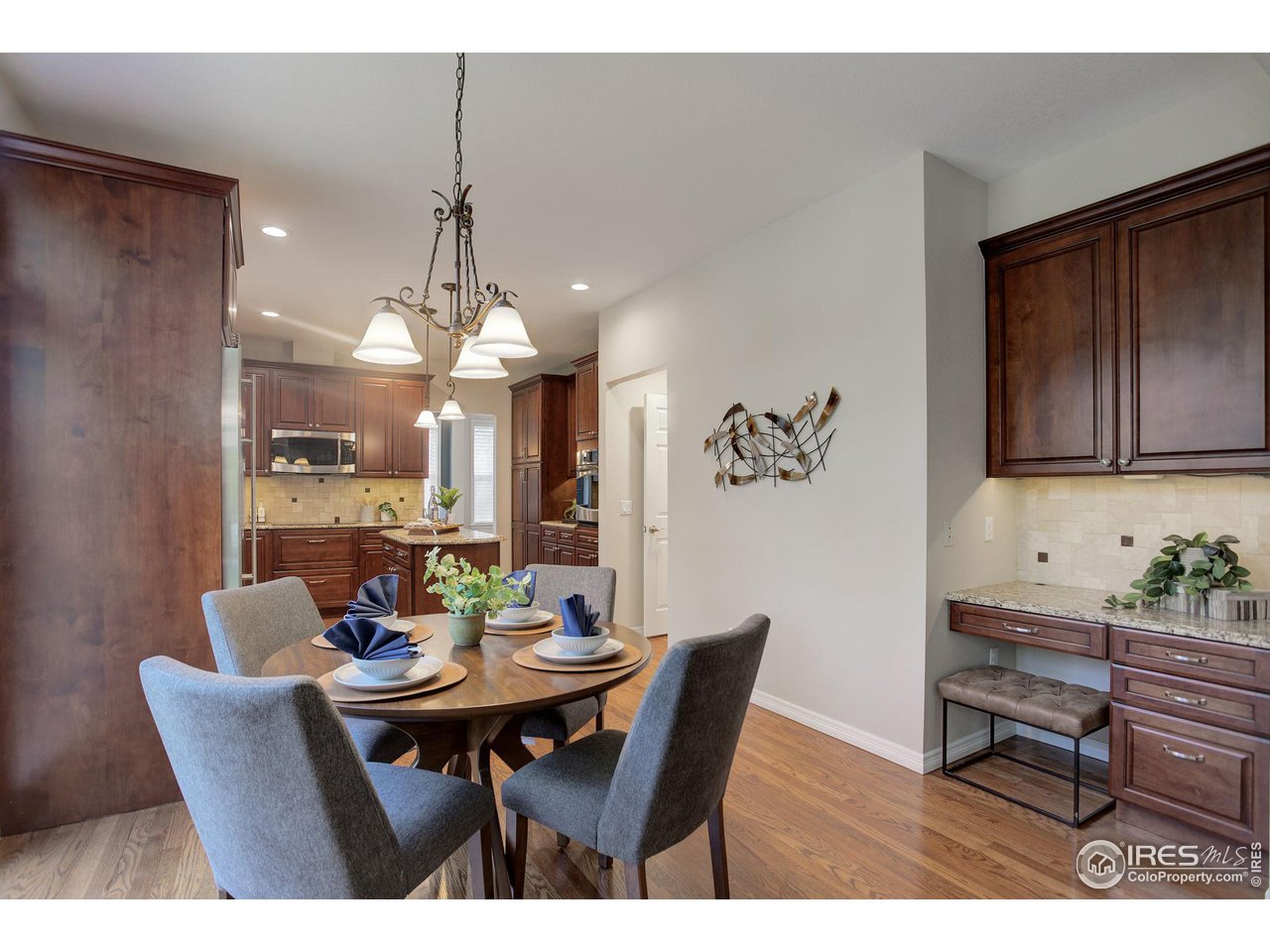 5218 Pinehurst Drive Boulder, CO 80301 - Photo 12 of 39 a view of a dining room with furniture and chandelier