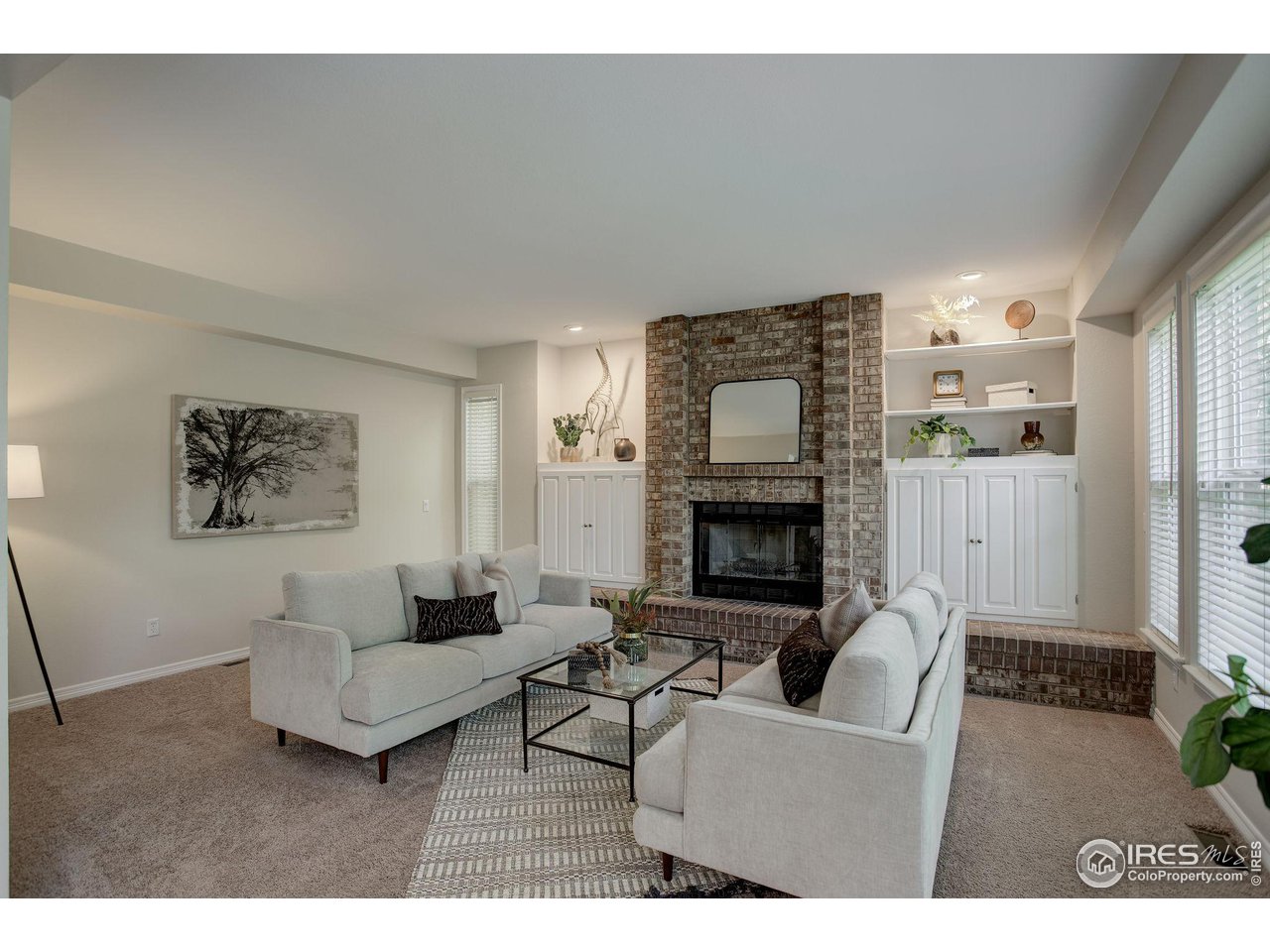5218 Pinehurst Drive Boulder, CO 80301 - Photo 15 of 39 a living room with furniture and a fireplace