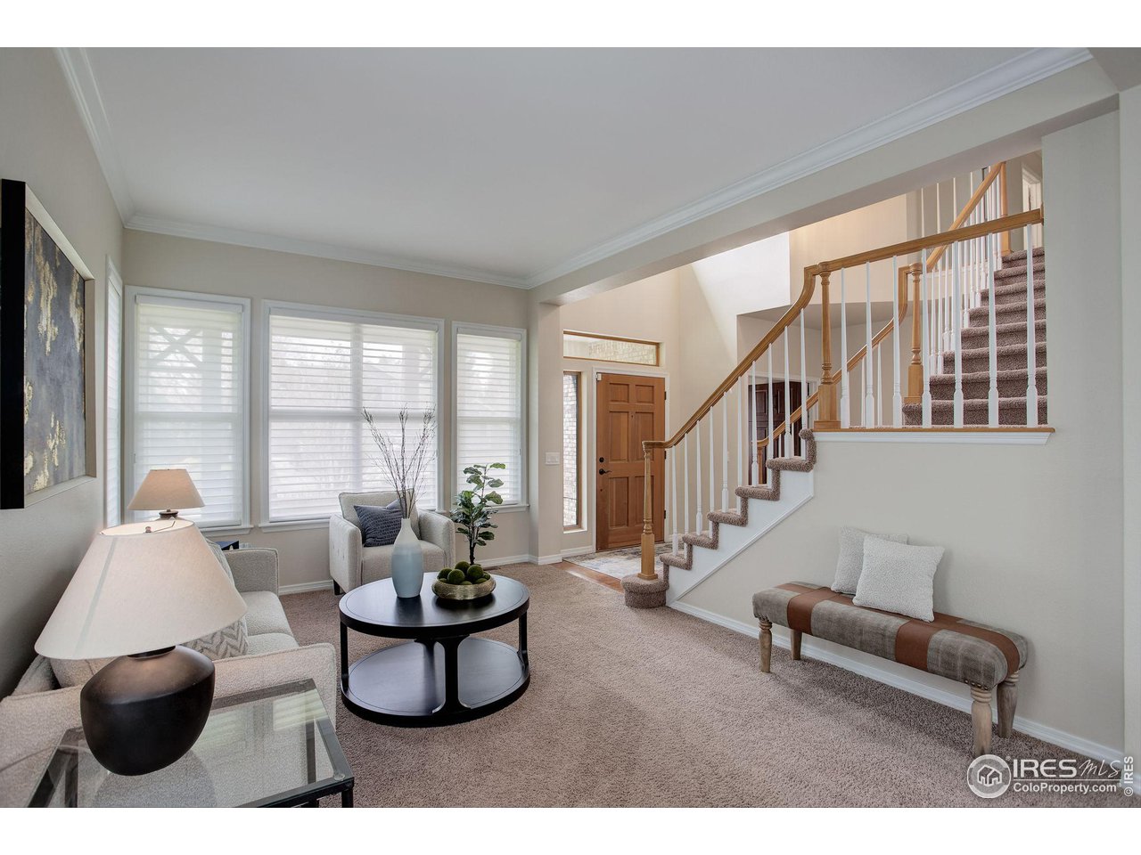 5218 Pinehurst Drive Boulder, CO 80301 - Photo 3 of 39 a living room with furniture and a potted plant