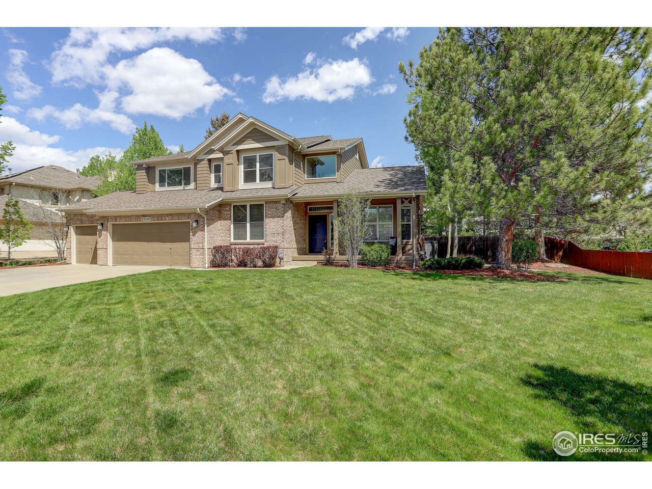 5218 Pinehurst Drive Boulder, CO 80301 - Photo 38 of 39 a front view of a house with a garden and plants