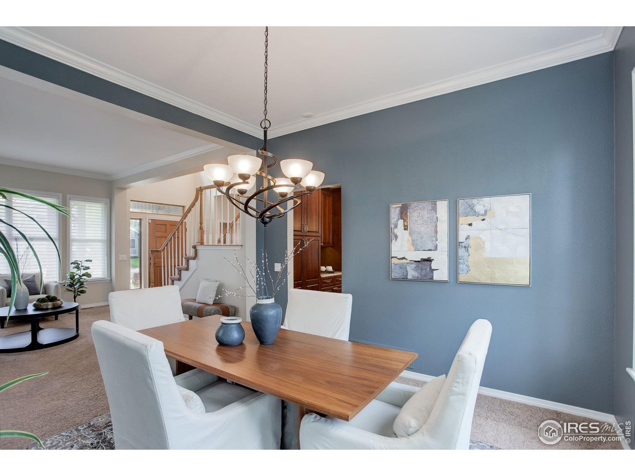 5218 Pinehurst Drive Boulder, CO 80301 - Photo 6 of 39 a view of a dining room with furniture window and wooden floor