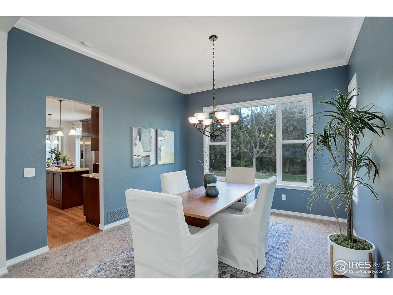 5218 Pinehurst Drive Boulder, CO 80301 - Photo 7 of 39 a dining room with furniture window and outdoor view