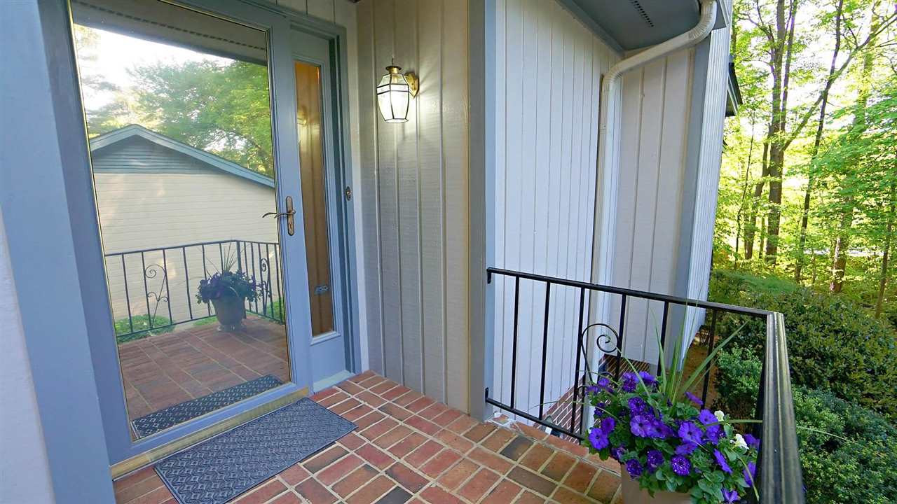 2801 Rue Sans Famille Raleigh, NC 27607 - Photo 3 of 26 Freshly painted doorway with glass storm door that locks for added protection. Also allows for light to come in during the day. Beautiful Entrance