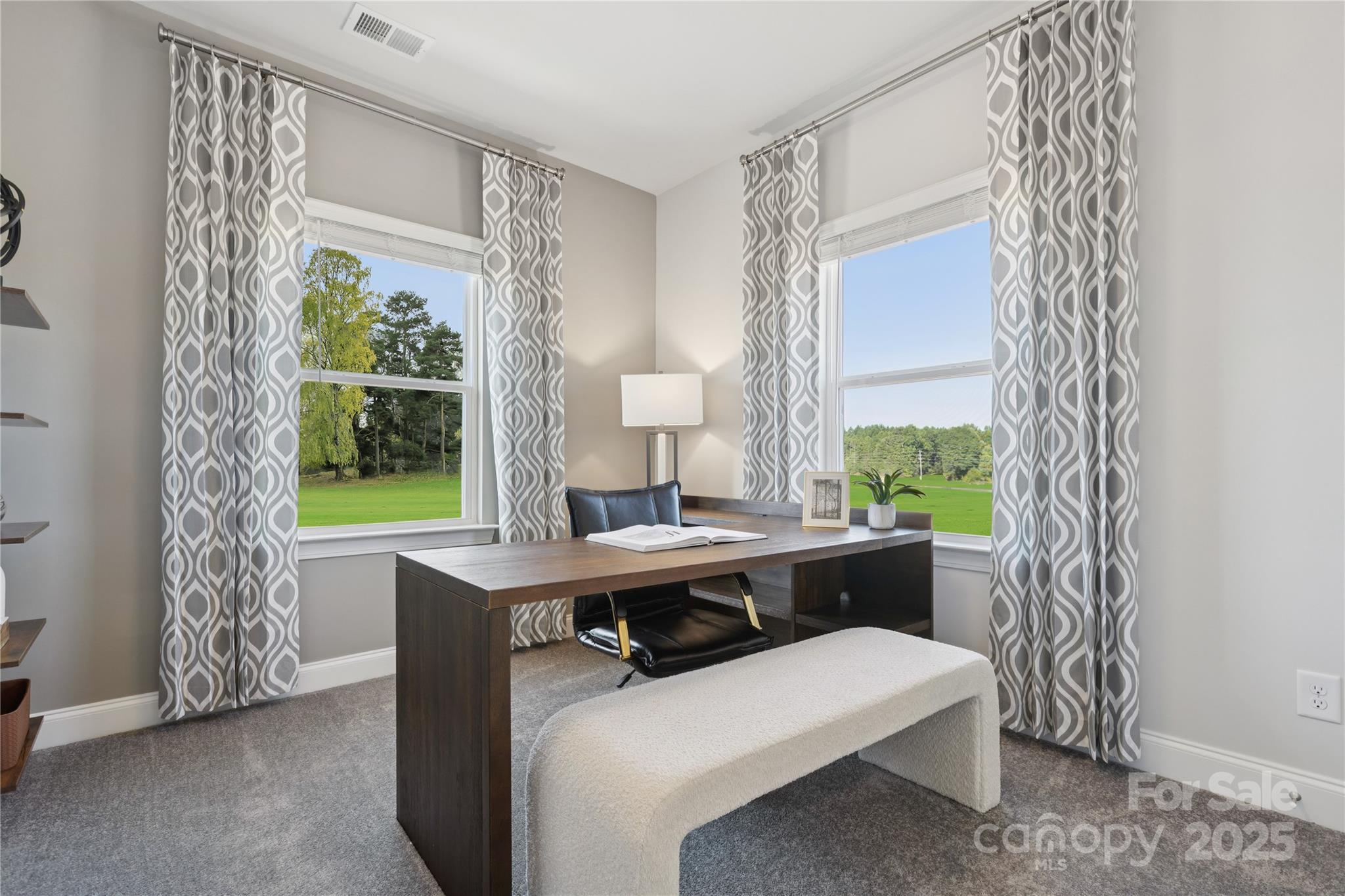 1828 Viewfield Road Fort Mill, SC 29708 - Photo 19 of 33 a room with furniture a window and a potted plant