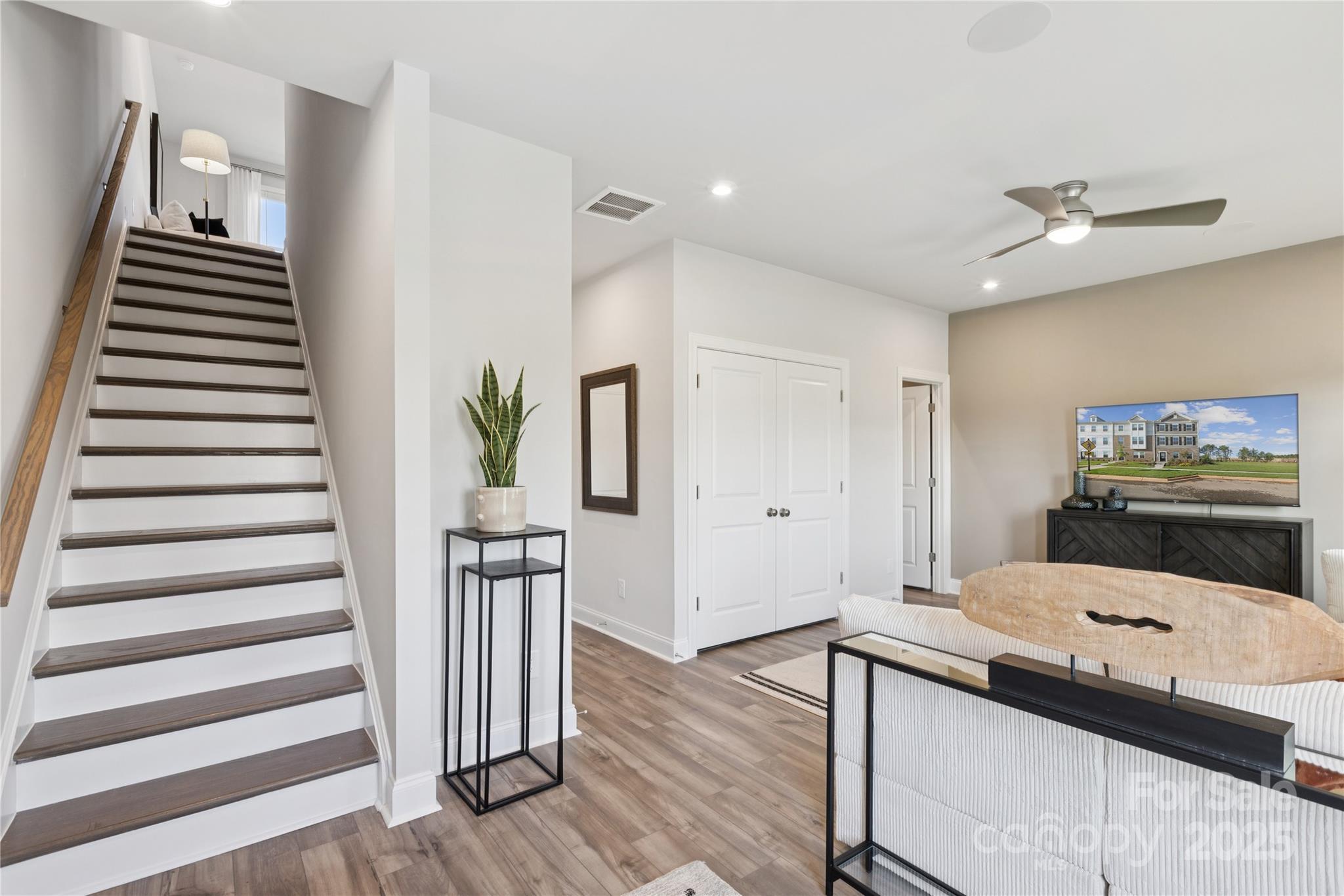 1828 Viewfield Road Fort Mill, SC 29708 - Photo 21 of 33 a living room with furniture and wooden floor