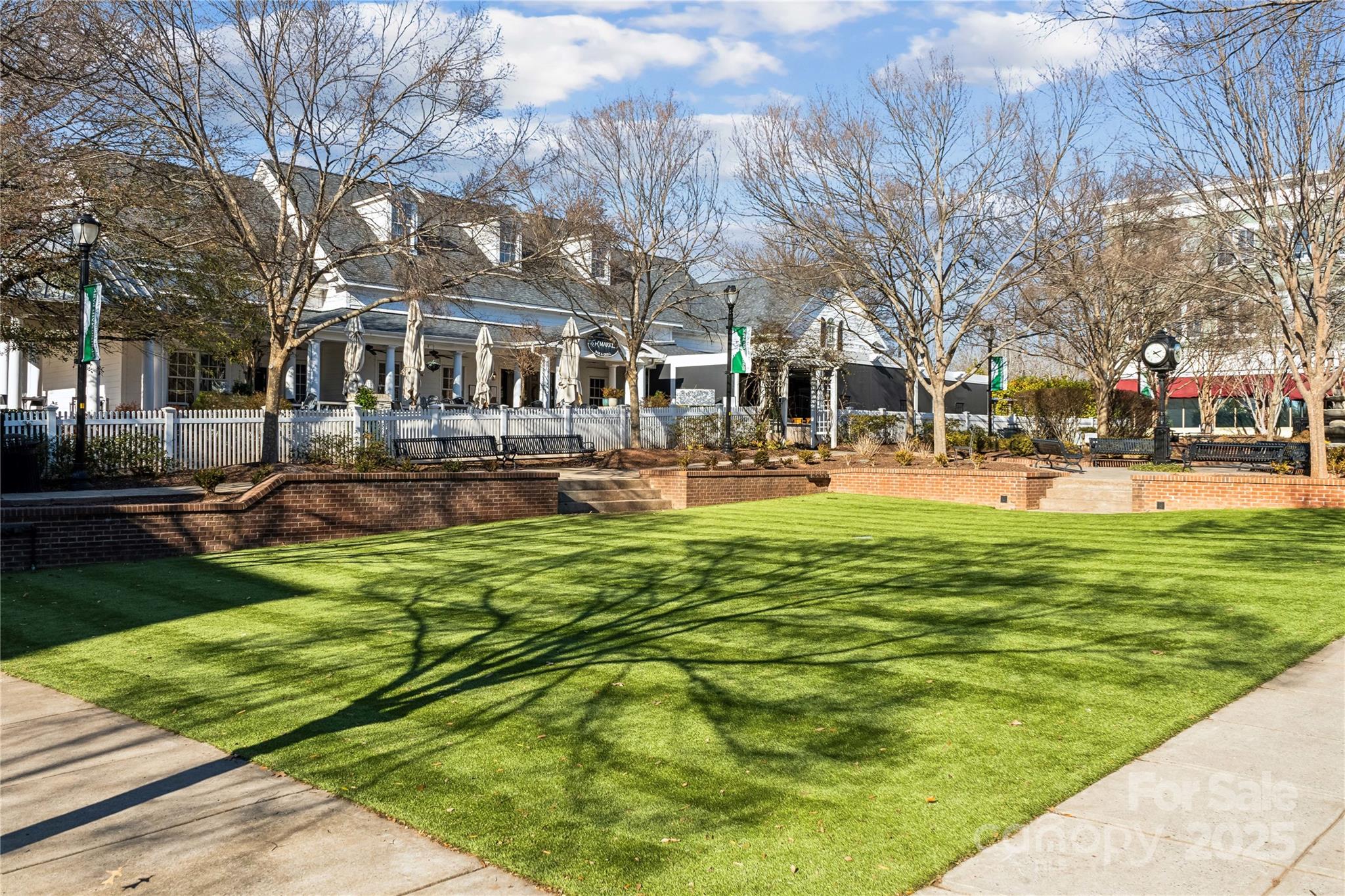 1828 Viewfield Road Fort Mill, SC 29708 - Photo 30 of 33 a front view of a building with a garden and trees