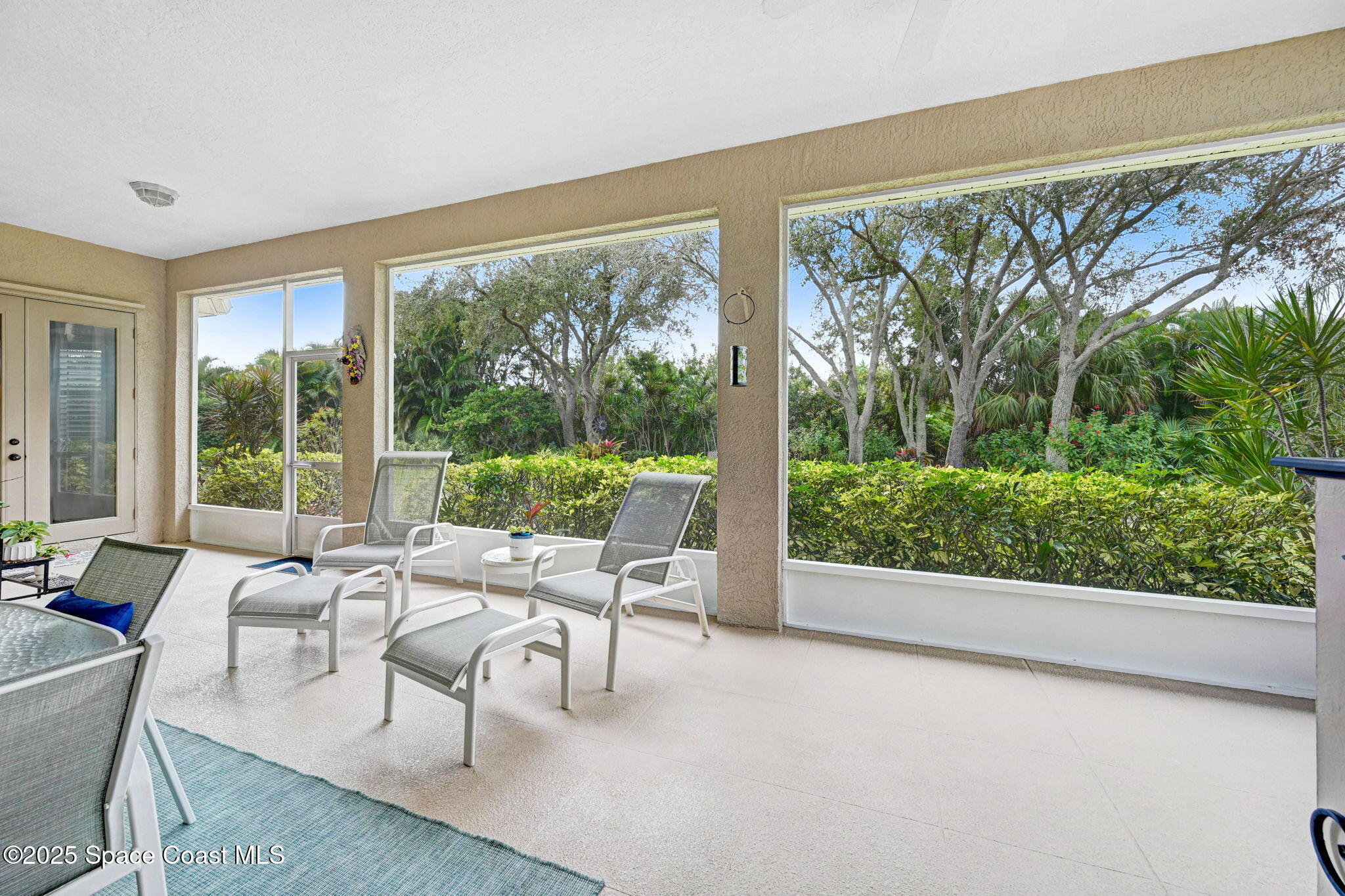 1692 Long Pine Road Melbourne, FL 32940 - Photo 38 of 43 a living room with furniture and a large window