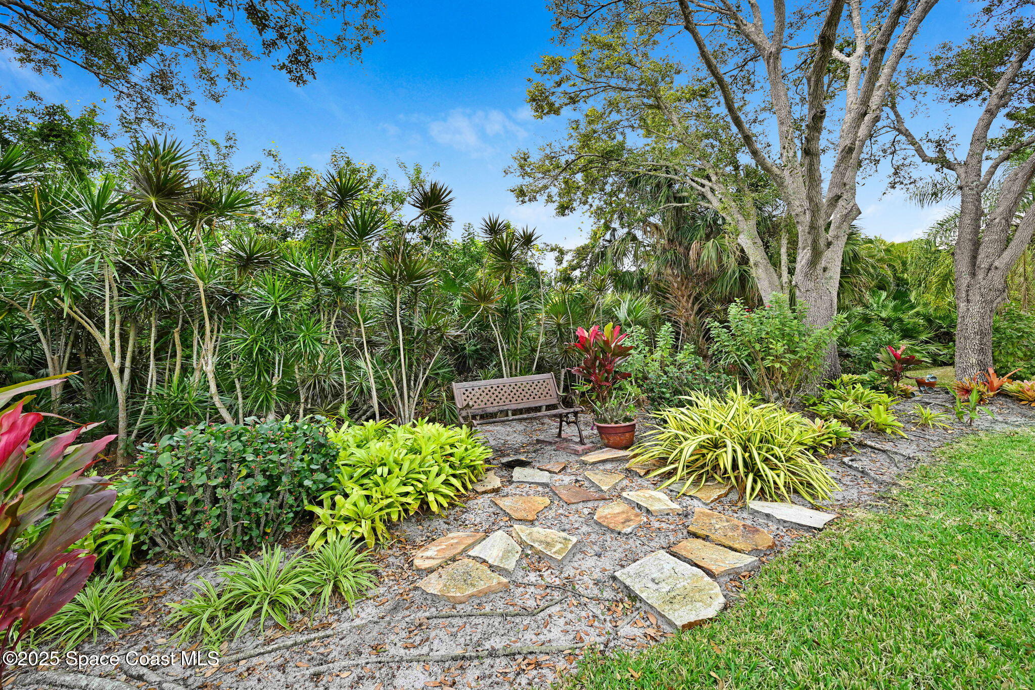 1692 Long Pine Road Melbourne, FL 32940 - Photo 41 of 43 a backyard of a house with outdoor seating