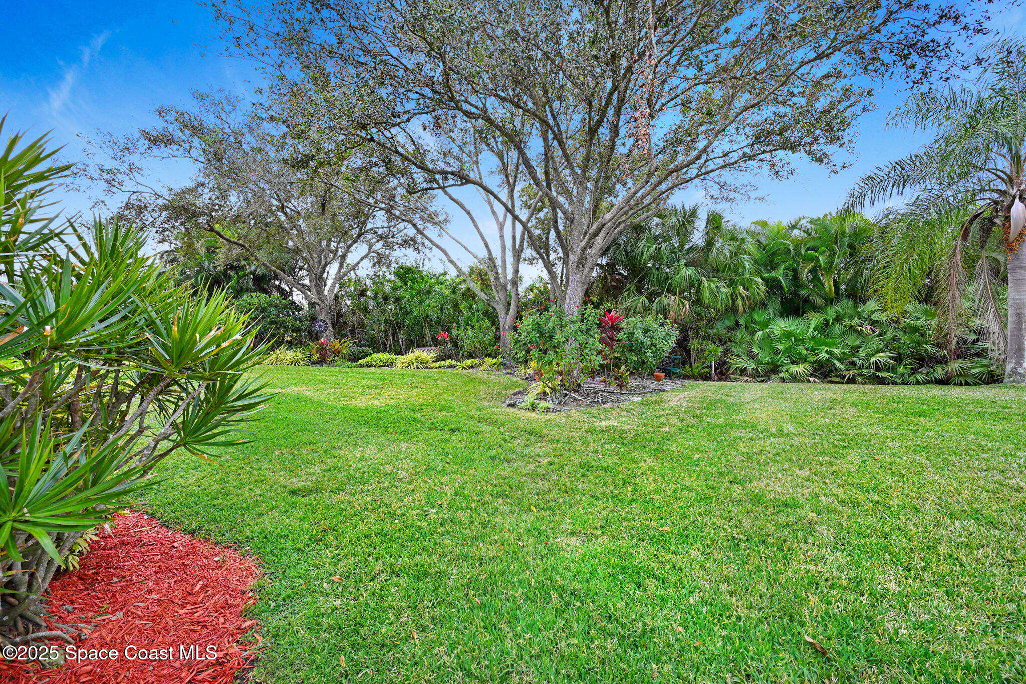 1692 Long Pine Road Melbourne, FL 32940 - Photo 42 of 43 a view of backyard with green space