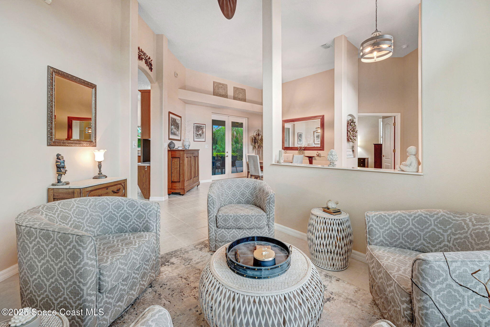 1692 Long Pine Road Melbourne, FL 32940 - Photo 8 of 43 a living room with furniture and a rug