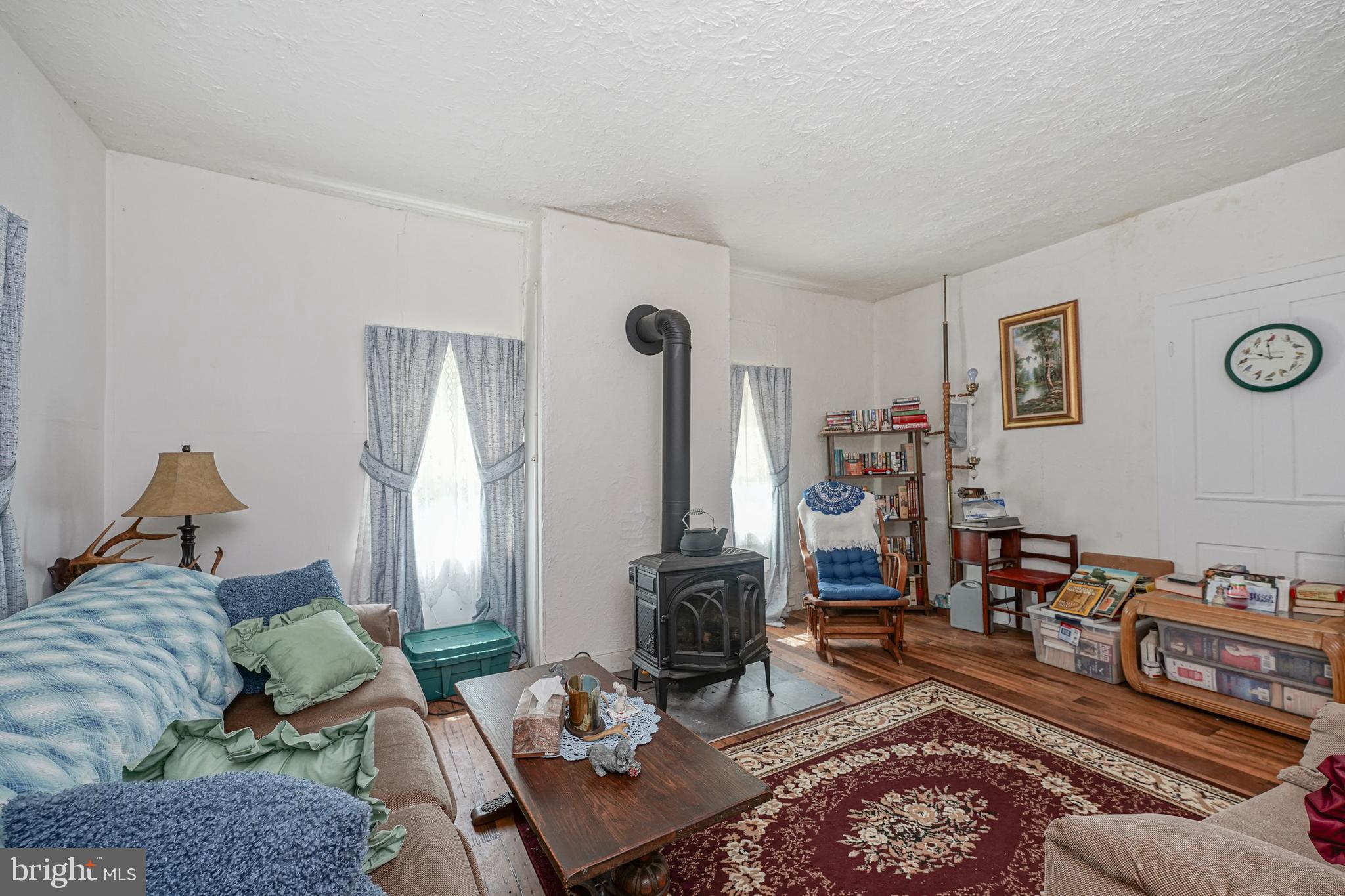 530 Penns Grove Auburn Road Penns Grove, NJ 08069 - Photo 30 of 36 a living room with furniture and wooden floor