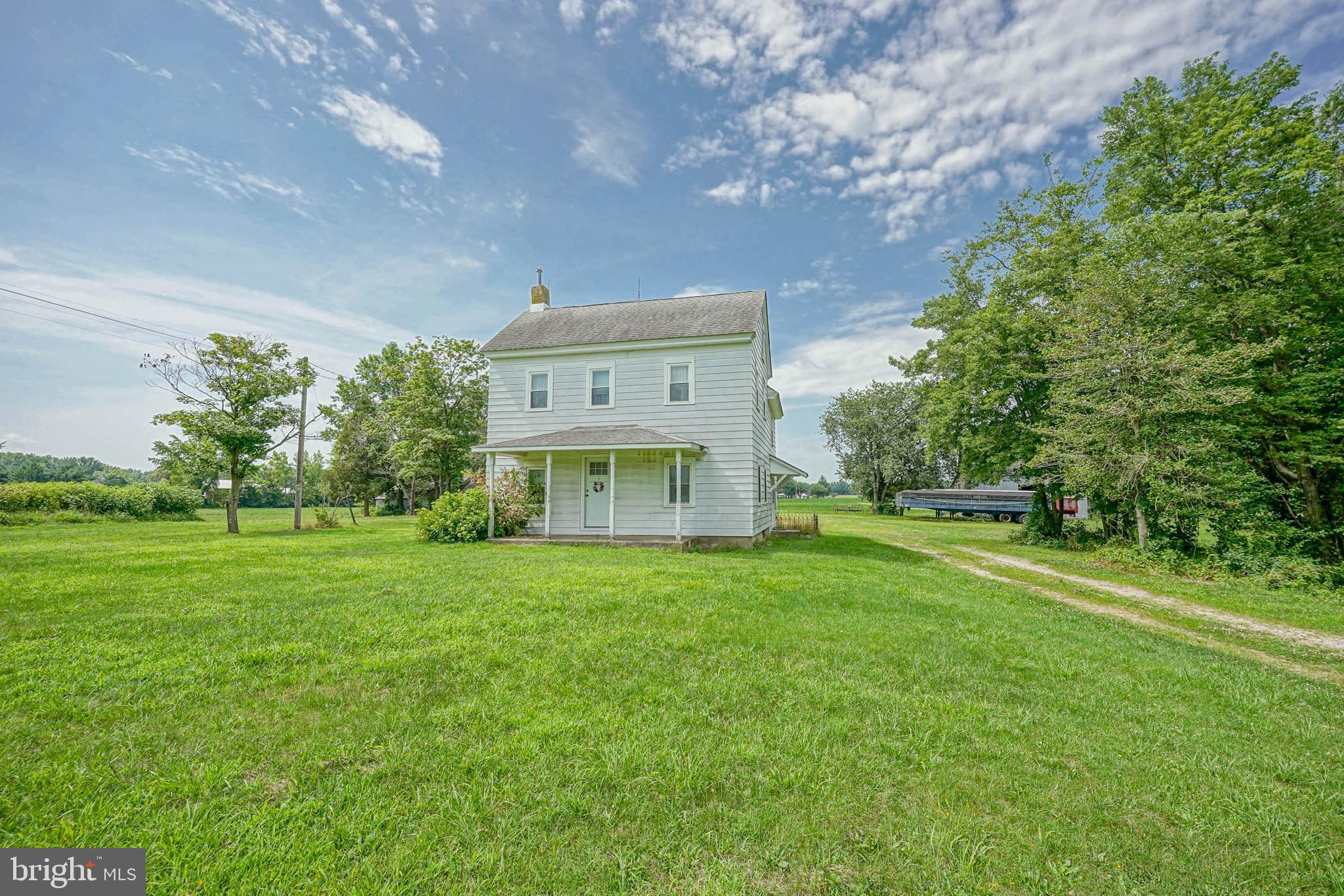 530 Penns Grove Auburn Road Penns Grove, NJ 08069 - Photo 31 of 36 a view of a big house with a big yard and large trees