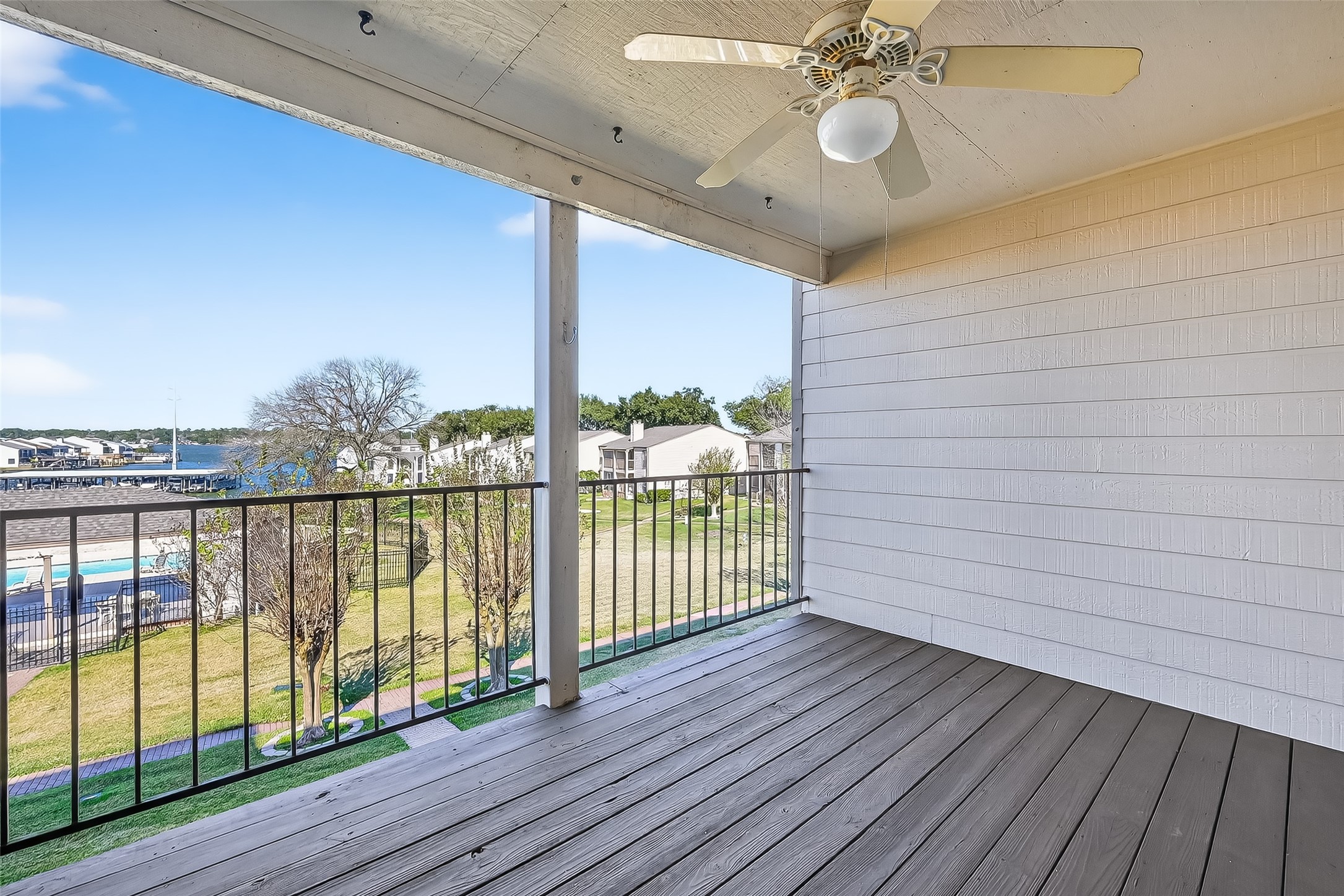 209 Lakeview Terrace, Unit D Conroe, TX 77356 - Photo 25 of 33 Pool and Lake Conroe view from the deck.