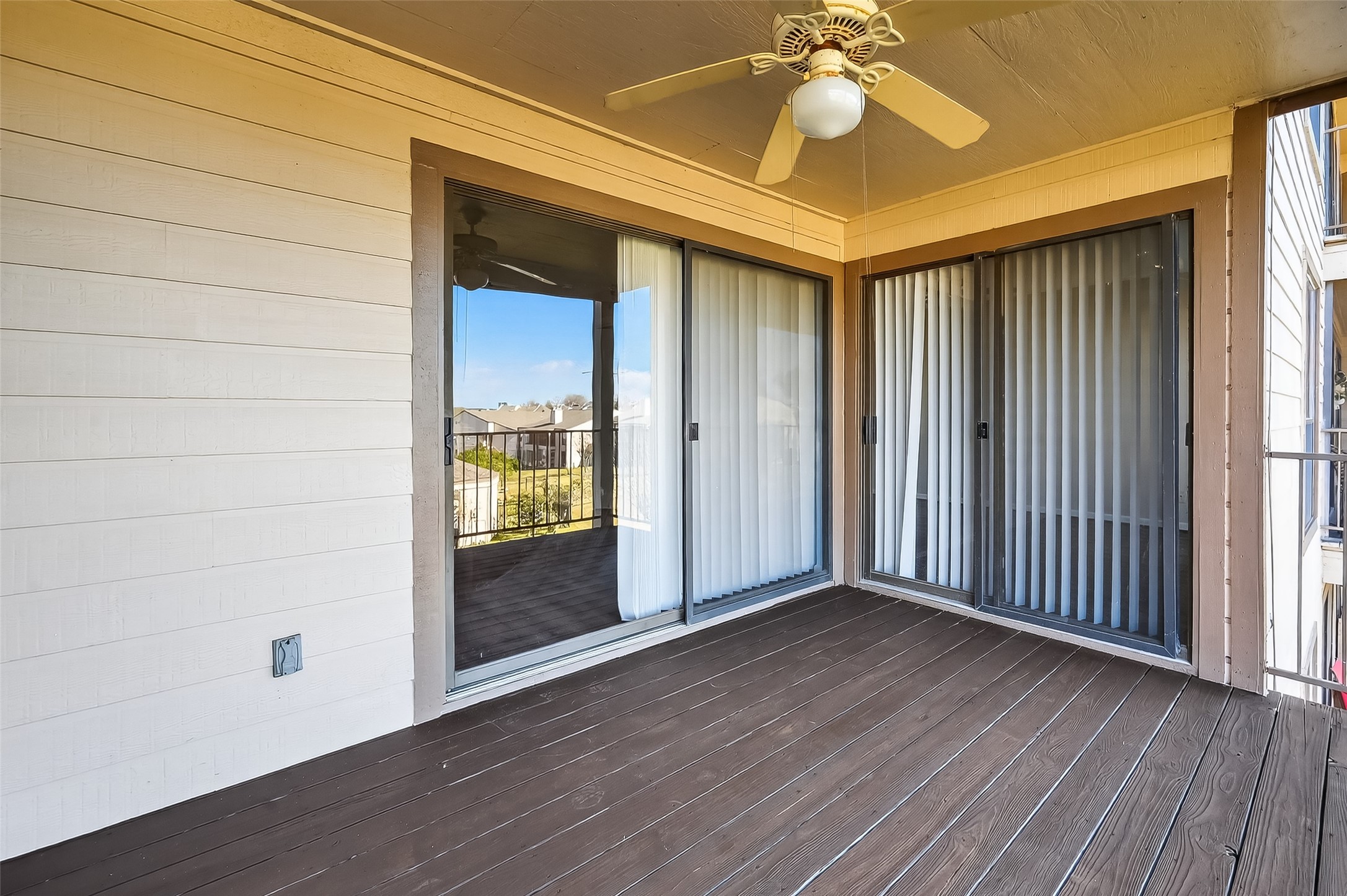 209 Lakeview Terrace, Unit D Conroe, TX 77356 - Photo 26 of 33 Sliding Glass Doors to Owners Suite and Family Room