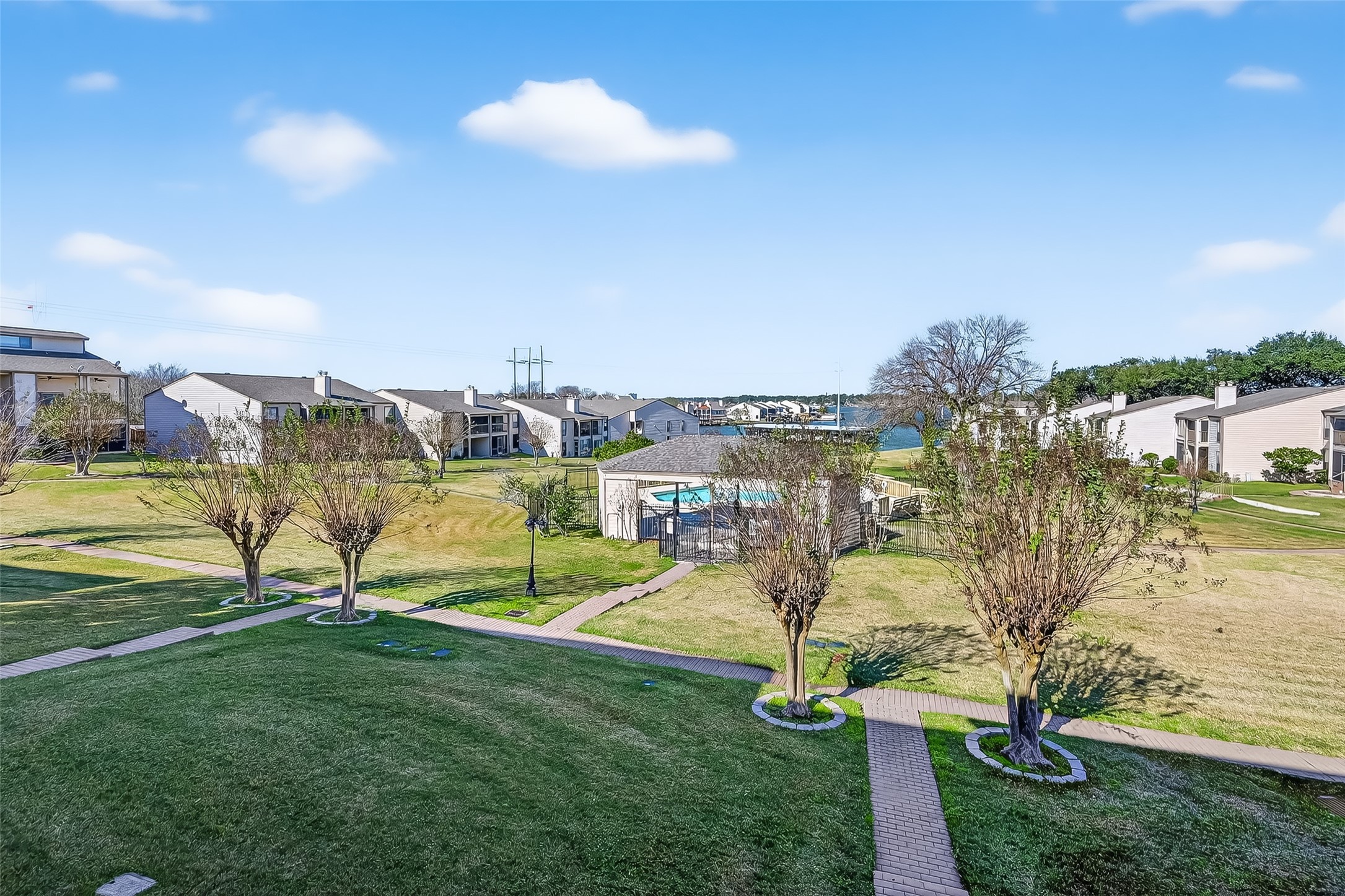 209 Lakeview Terrace, Unit D Conroe, TX 77356 - Photo 27 of 33 View of Lake Conroe and pool off back deck