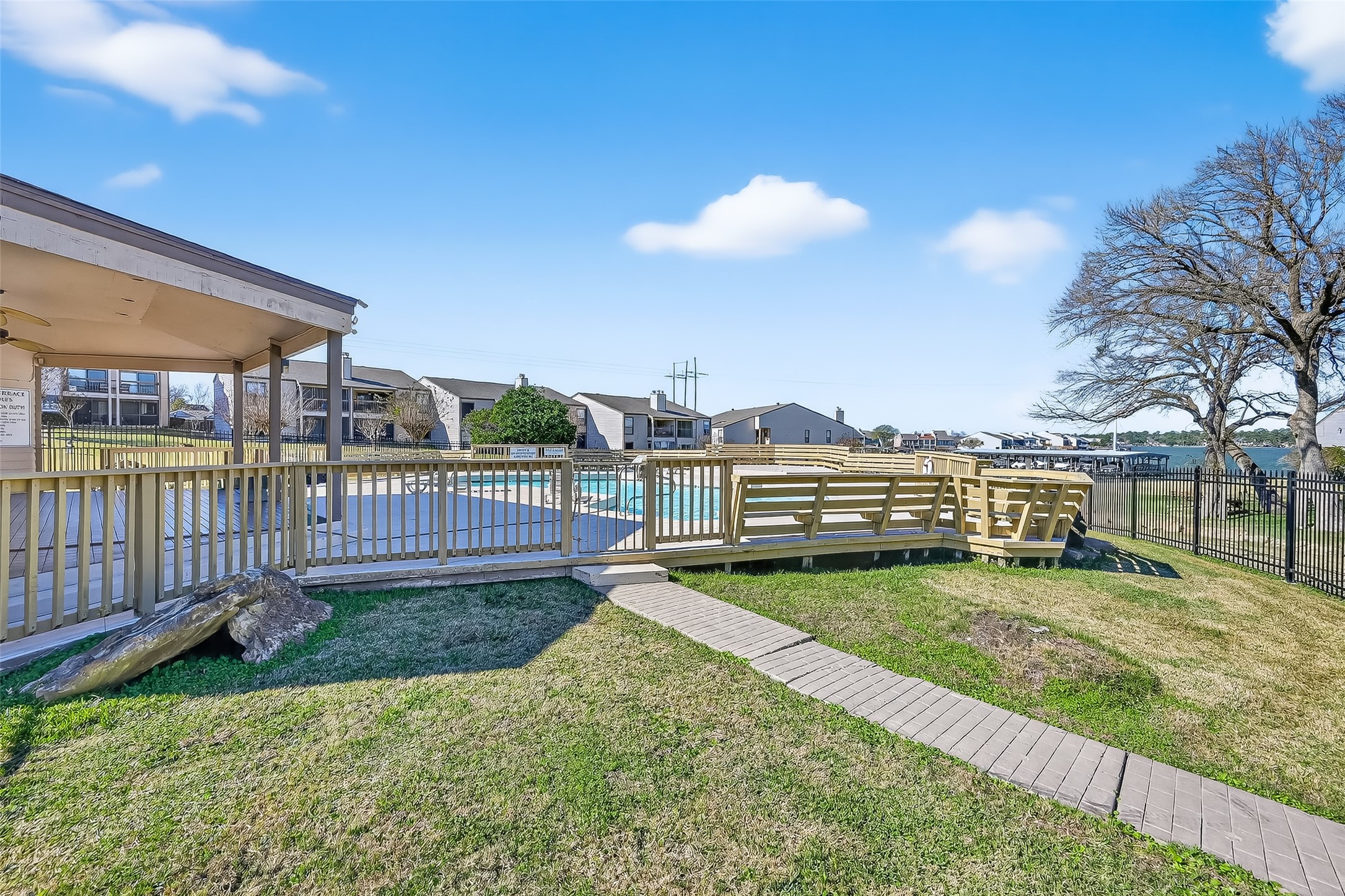 209 Lakeview Terrace, Unit D Conroe, TX 77356 - Photo 4 of 33 Pool with view of Lake Conroe