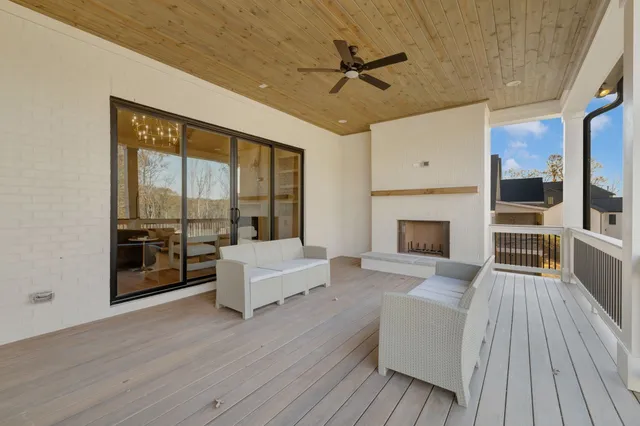 a kitchen with granite countertop a sink and cabinets