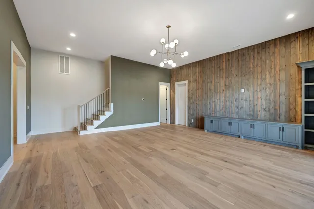 a bathroom with a shower and a sink