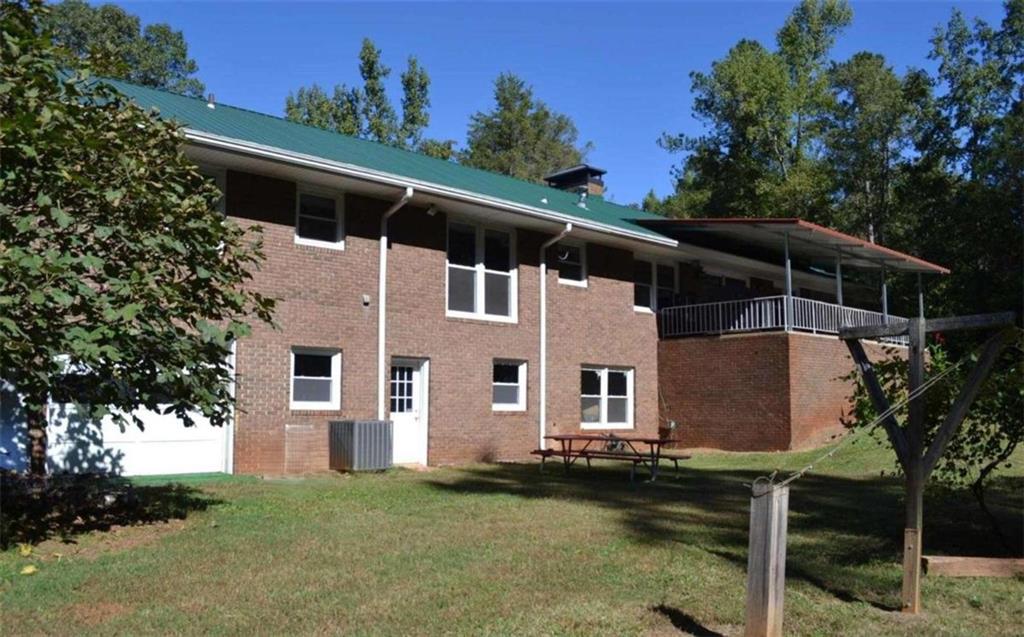 2816 Klondike Road Southwest Conyers, GA 30094 - Photo 3 of 7 a view of house with backyard