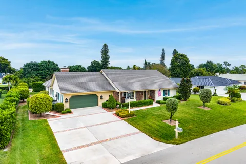 $925,000 | 420 Muirfield Drive, Atlantis, FL 33462