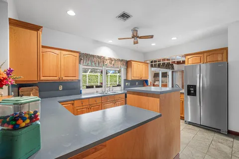 $925,000 | 420 Muirfield Drive, Atlantis, FL 33462