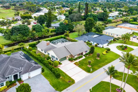 $925,000 | 420 Muirfield Drive, Atlantis, FL 33462