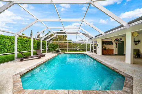 $925,000 | 420 Muirfield Drive, Atlantis, FL 33462