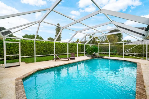 $925,000 | 420 Muirfield Drive, Atlantis, FL 33462