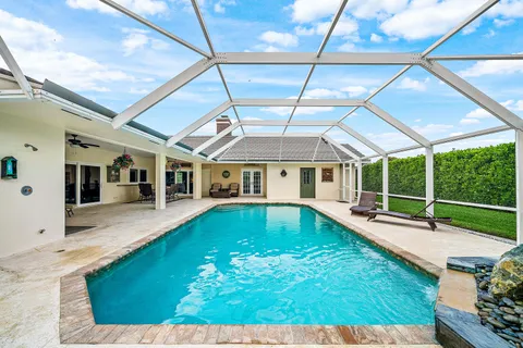 $925,000 | 420 Muirfield Drive, Atlantis, FL 33462