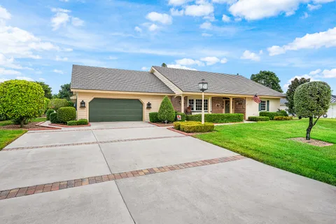 $925,000 | 420 Muirfield Drive, Atlantis, FL 33462