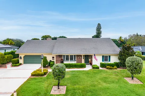 $925,000 | 420 Muirfield Drive, Atlantis, FL 33462