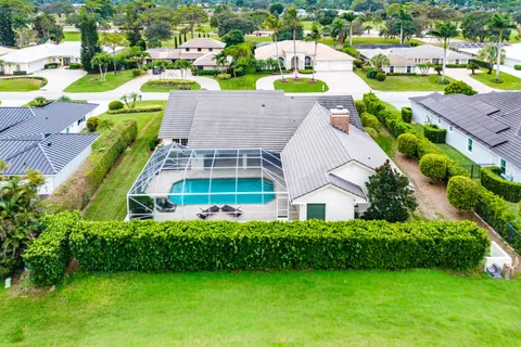 $925,000 | 420 Muirfield Drive, Atlantis, FL 33462