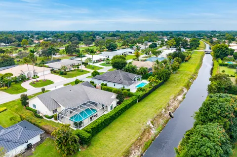 $925,000 | 420 Muirfield Drive, Atlantis, FL 33462