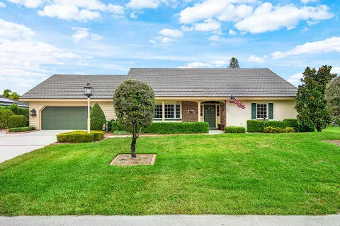 $925,000 | 420 Muirfield Drive, Atlantis, FL 33462