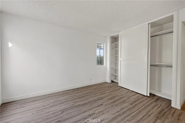 a bathroom with a shower a toilet and a shower