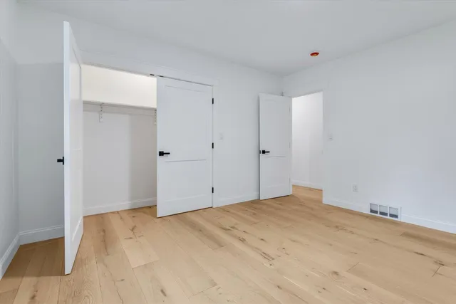 a view of a lake with a big yard