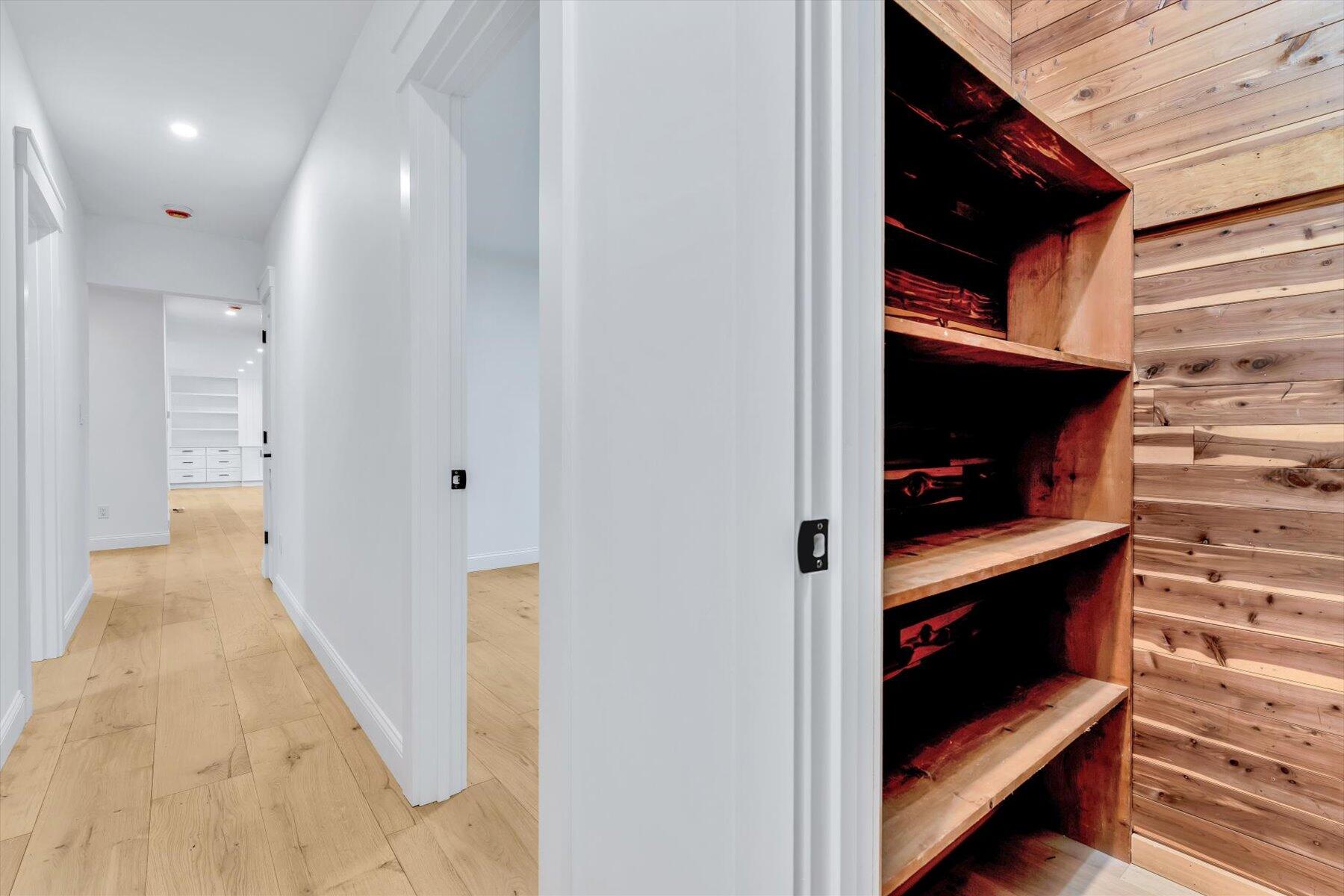 40 Sachem Drive Centerville, MA 02632 - Photo 49 of 56 a view of hallway with stairs and wooden floor