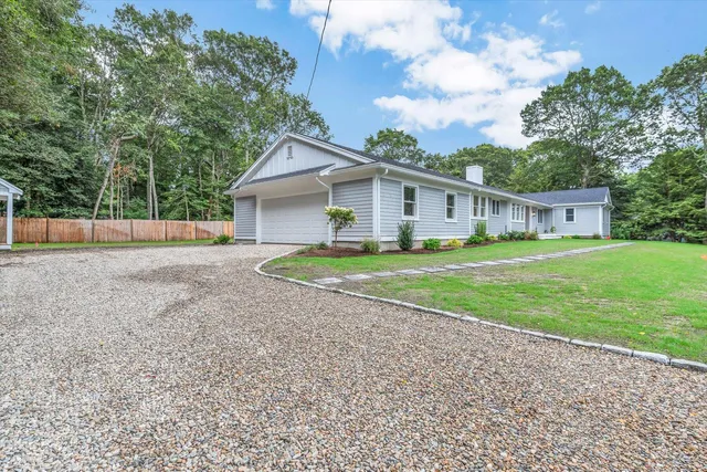 a view of a swimming pool and an outdoor space