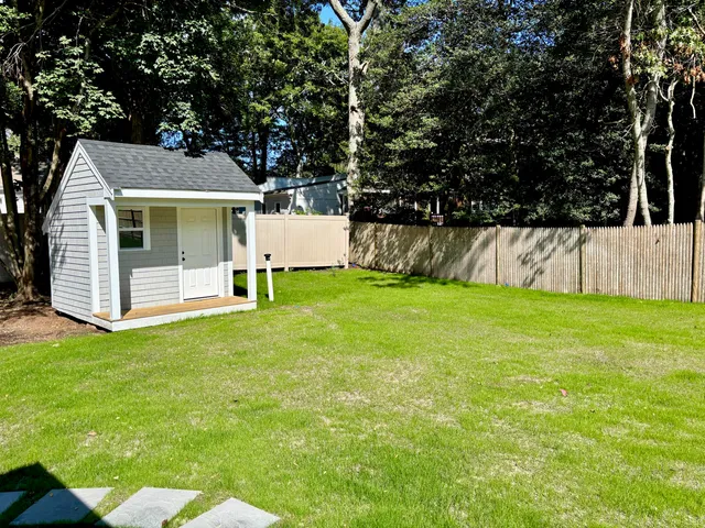 a view of a house with a swimming pool