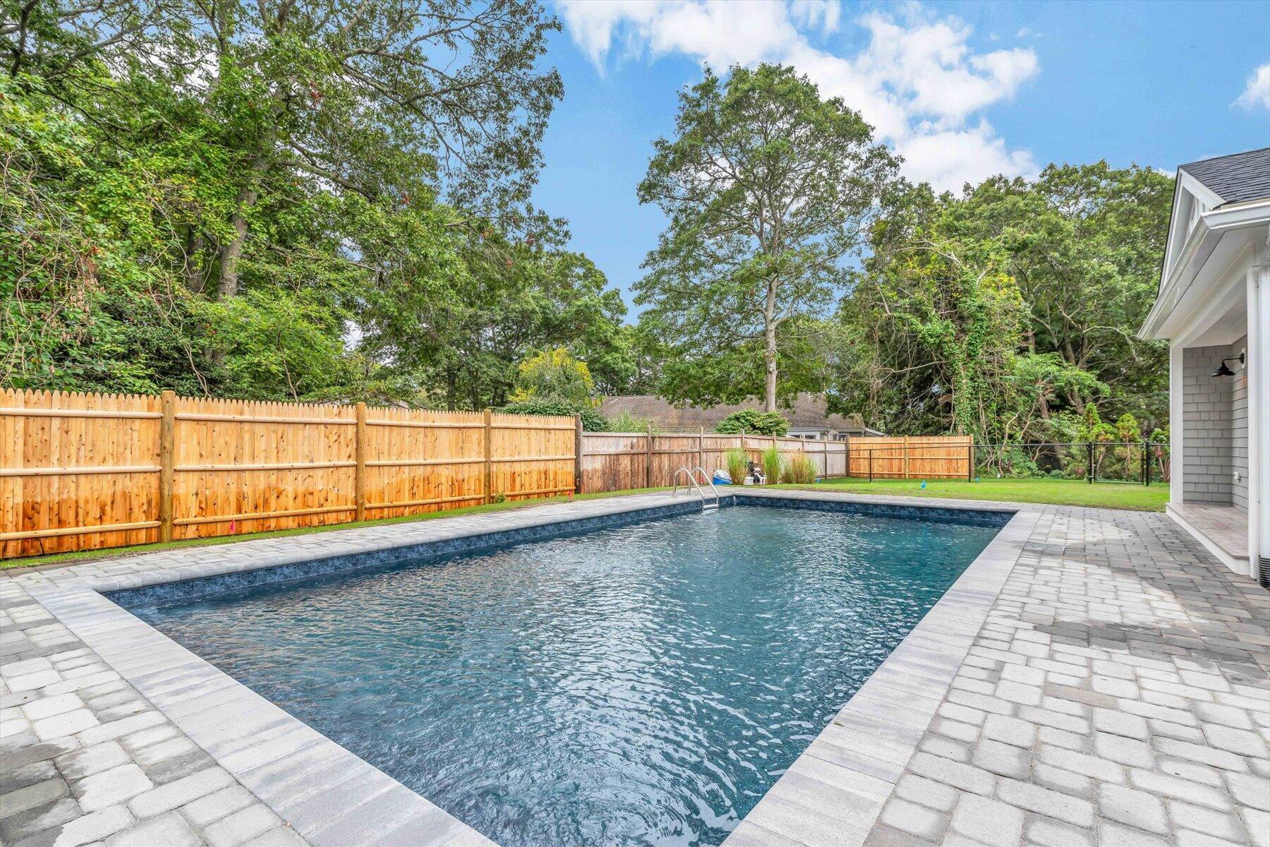 40 Sachem Drive Centerville, MA 02632 - Photo 9 of 56 a view of a swimming pool and an outdoor space
