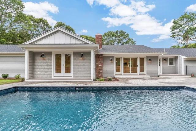 a view of a house with a swimming pool