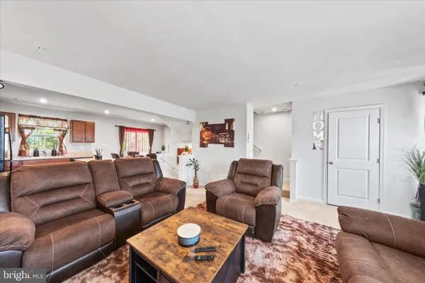 a living room with furniture and a couch