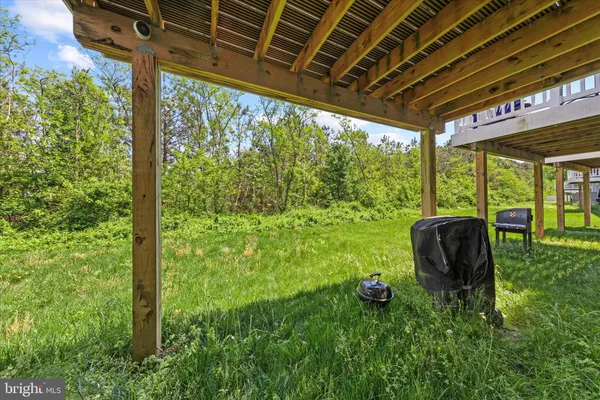 a backyard of a house with seating space