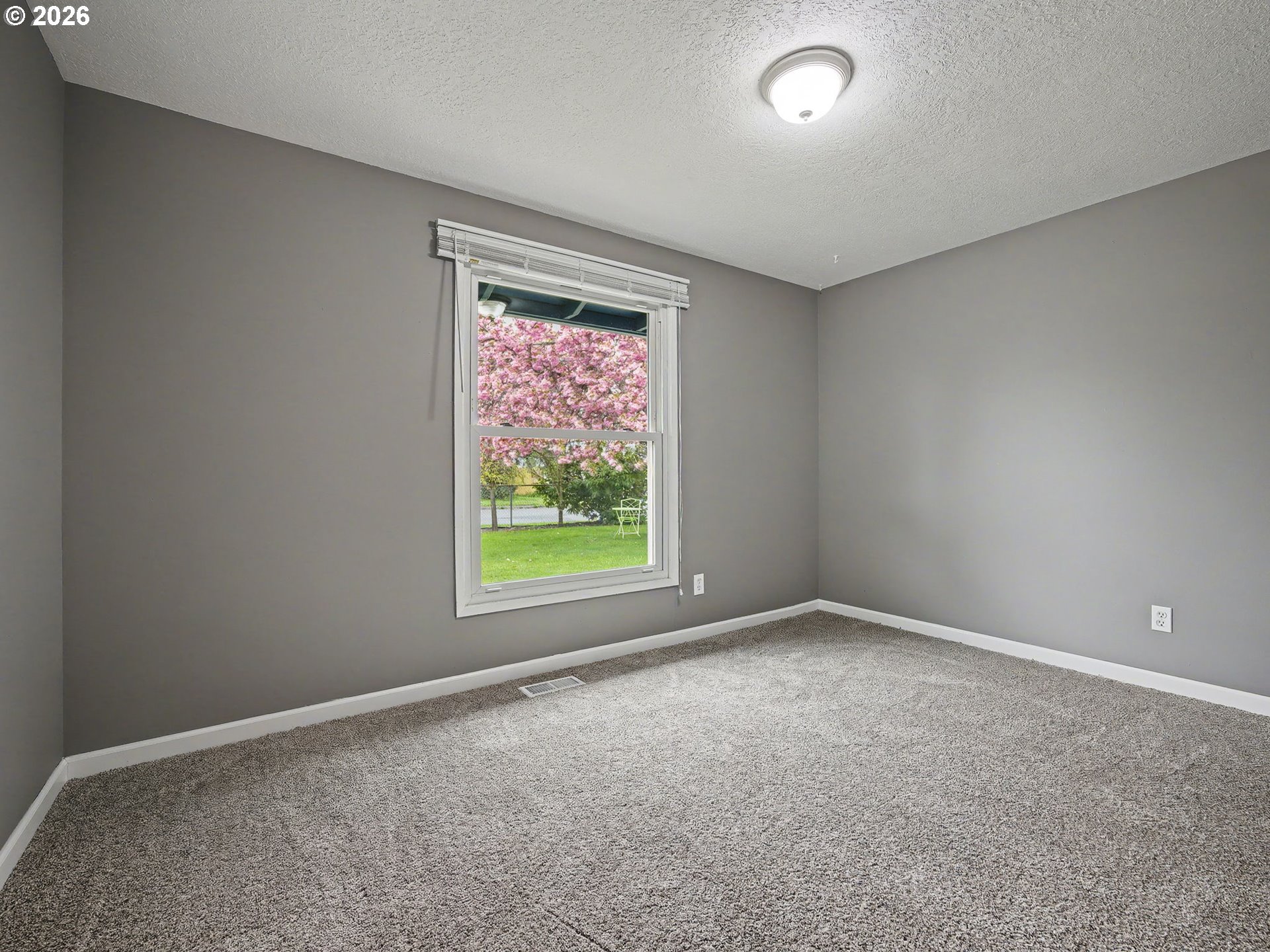 1780 Southeast 2nd Place Gresham, OR 97080 - Photo 14 of 25 an empty room with windows