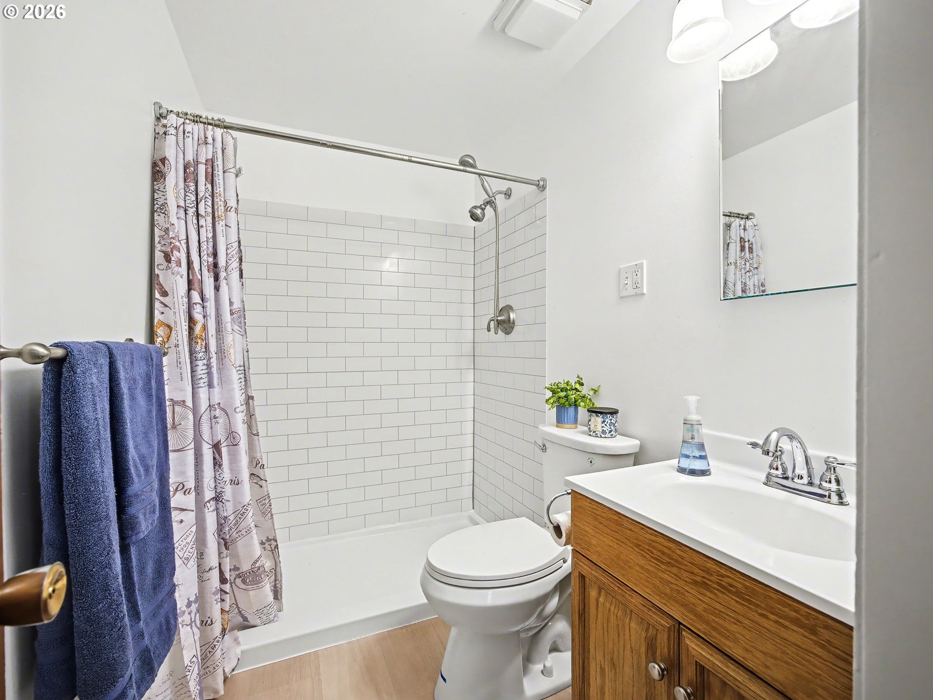 1780 Southeast 2nd Place Gresham, OR 97080 - Photo 15 of 25 a bathroom with a sink toilet and shower