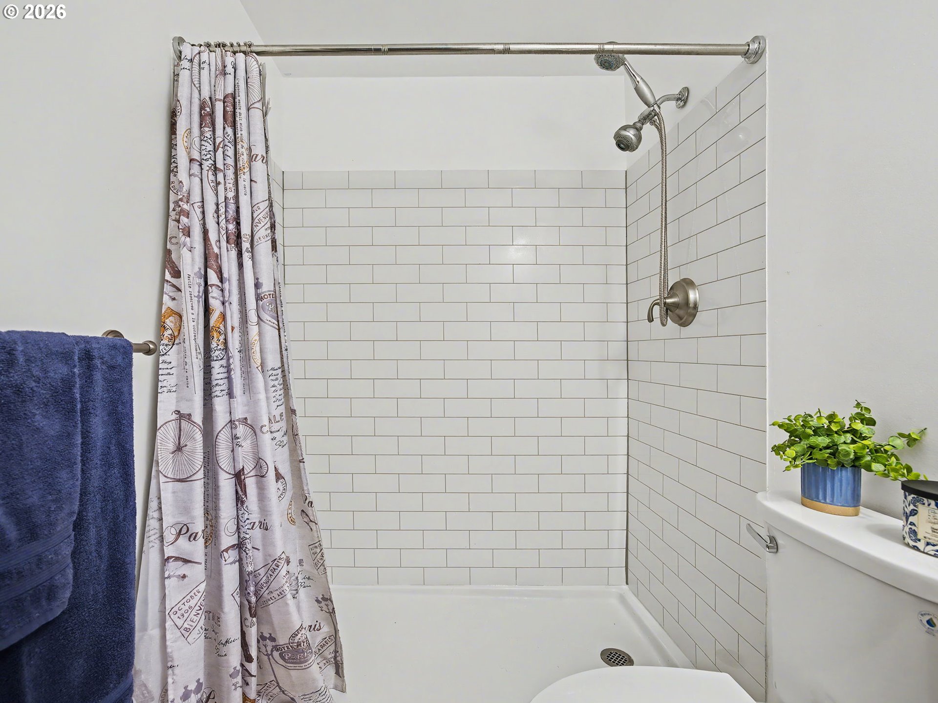1780 Southeast 2nd Place Gresham, OR 97080 - Photo 16 of 25 a bathroom with a shower and a plant