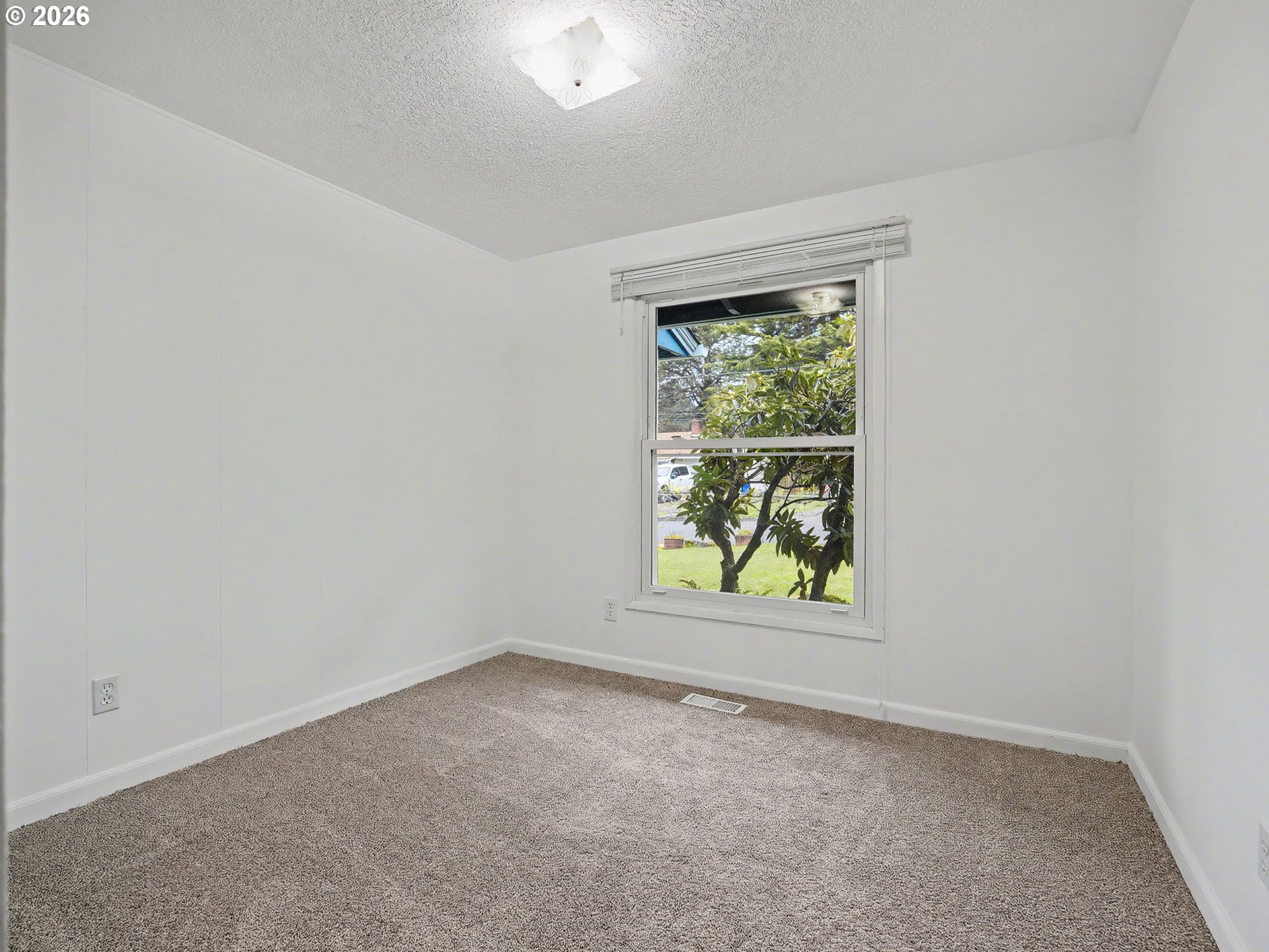 1780 Southeast 2nd Place Gresham, OR 97080 - Photo 21 of 25 an empty room with windows