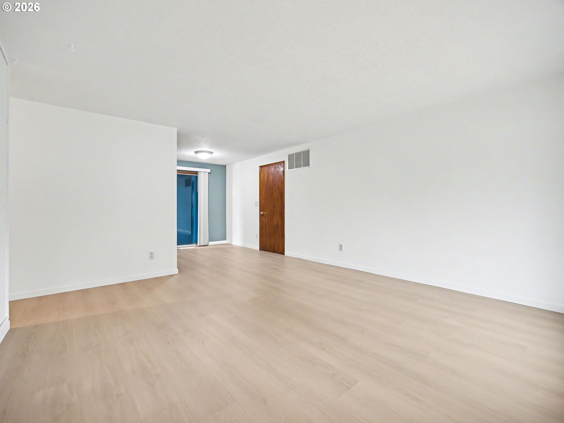 1780 Southeast 2nd Place Gresham, OR 97080 - Photo 5 of 25 a view of an empty room with wooden floor