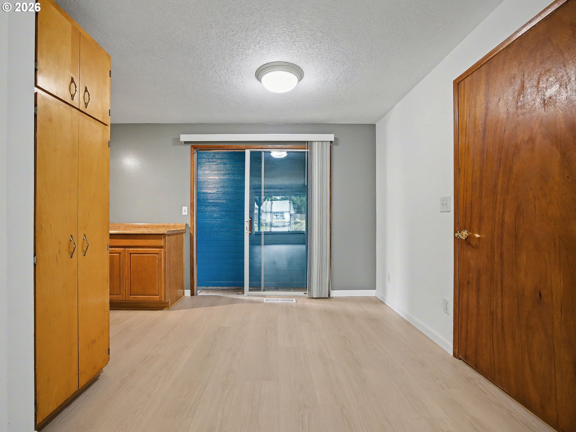 1780 Southeast 2nd Place Gresham, OR 97080 - Photo 8 of 25 a view of a hallway with wooden shelves